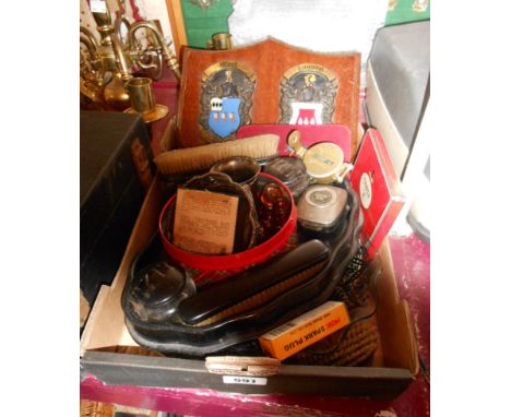 A box containing a quantity of collectable items including compass, model cars, tins, brushes, etc.