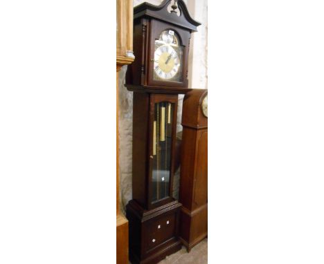 A 20th Century mahogany longcase clock with 'Tempus Fugit' arched dial, glazed trunk door and German triple weight driven eig