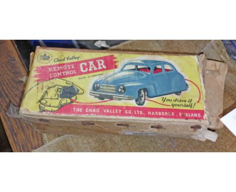 A vintage Chad Valley remote control car in original box