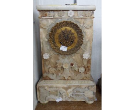 A late Victorian ornate alabaster and marble cased mantle clock with decorative cast brass dial and french eight day bell str