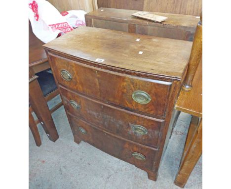 A 75cm antique style mahogany bow front chest of three long graduated drawers, set on bracket feet