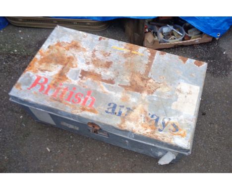 A vintage galvanised tin lift-top trunk