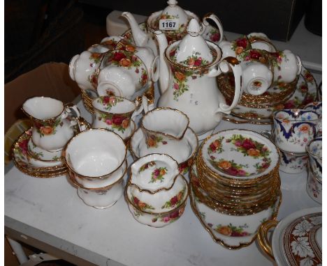 A large quantity of Royal Albert Old Country Roses teaware including coffee pot, teapot, milk and sugar, cream and sugar, lid