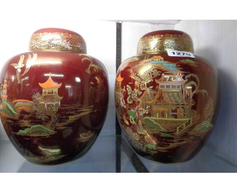 A pair of Carltonware Rouge Royale ginger jars and covers, each decorated in gilt and coloured enamels with oriental scenes o