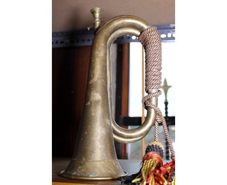 BRASS BUGLE. Vintage bugle with original cord and tassles