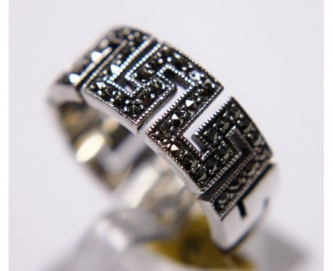 SILVER MARCASITE BAND. Sterling silver heavy set marcasite band, size Q/R