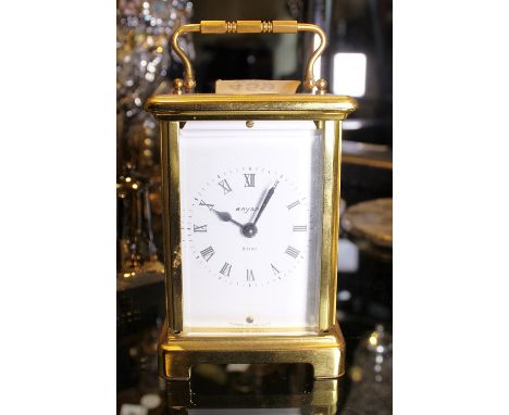 BAYARD EIGHT DAY CARRIAGE CLOCK. Bayard eight day brass carriage clock with bevelled glass panels