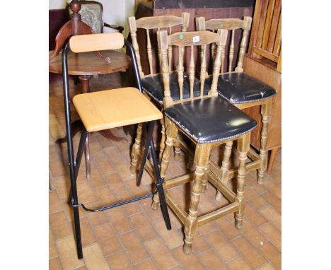 LIGHT OAK STOOLS. Three light oak framed leather upholstered stools