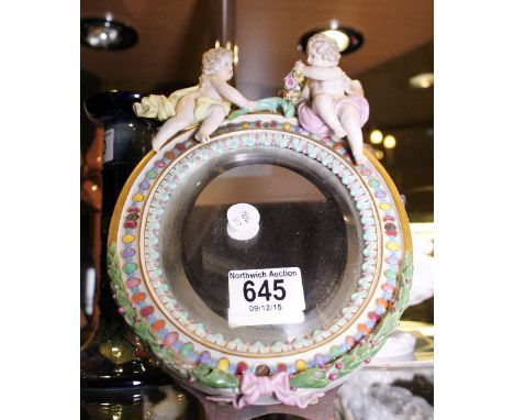 MEISSEN ANTIQUE CERAMIC BEVEL EDGED MIRROR. Meissen antique ceramic bevel edged mirror with cherub figures to top, 17 x 24cm