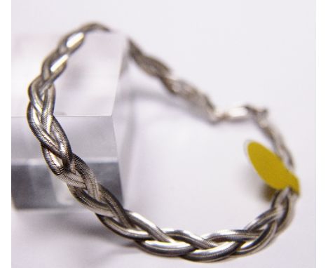 SILVER WOVEN BRACELET. Sterling silver flat woven bracelet