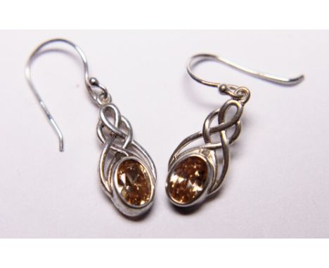 SILVER CELTIC DROP EARRINGS. Sterling silver champagne stone set Celtic drop earrings