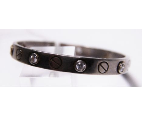 SILVER BANGLE. 925 silver stone set bangle