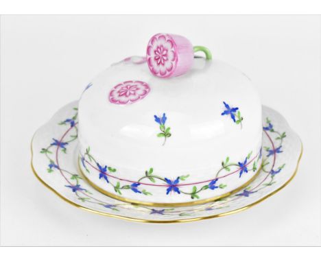 A Herend porcelain lidded butter dish, in the blue garland pattern, with sliced pink fruit finial, the underside with overgla