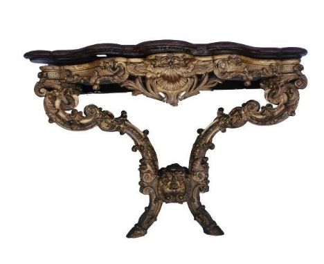 A Louis XV style giltwood and marble console table, the shaped griotte marble top with moulded border, above a carved shell a