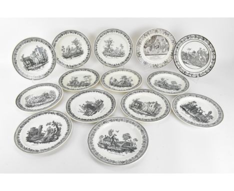 A collection of 19th century French faience plates, to include a set of four illustrating mythological scenes with cupid and 