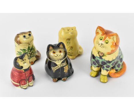 Joan and David De Bethel - A 1970s papier-mâché model of a seated cat, the underside titled 'Special Puce' numbered 4033, sig