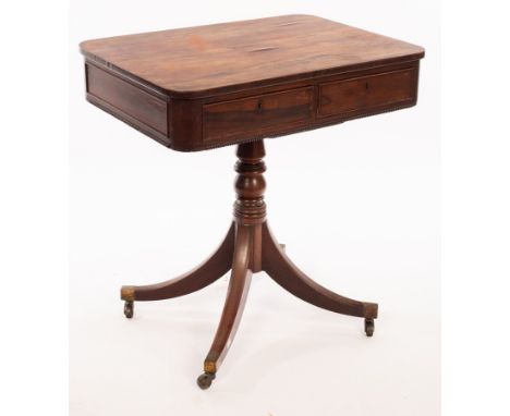 A Regency rosewood lamp table, with rounded top and two drawers on splayed quadripartite base, 71cm wide CONDITION REPORT: Co