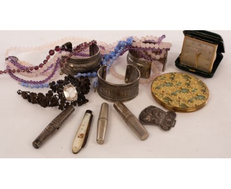 A quantity of costume jewellery including Eastern white metal cuffs, beads, monogrammed buttons by Pitt &amp; Co, half a Chin