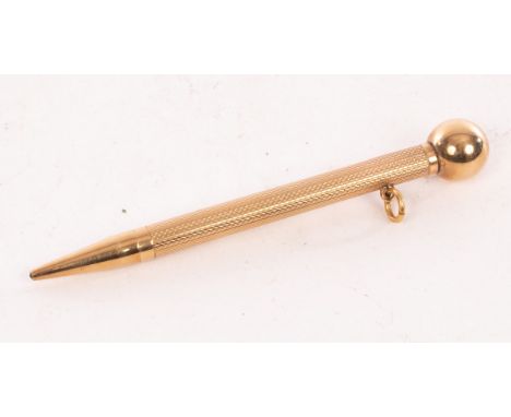 A 9ct yellow gold propelling pencil, M Wachenheimer &amp; Co Ltd, Birmingham 1959, with ball terminal and engine turned decor