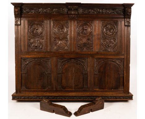 A multi-panel section of panelling, 16th Century and later, incorporating four French or Flemish Romayne portrait roundels, 1