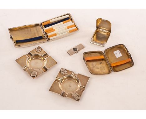 A silver cigarette case, D Bros, Birmingham 1923, with engine turned decoration, a match book holder, Birmingham 1925, anothe