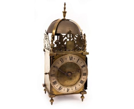 An English lantern clock with pin and hoop support, the bell strapwork support with central pierced and engraved spandrel ins