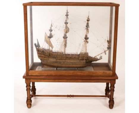 A scale model of a man-o-war, Sovereign of the Seas 1637, in a glazed case on stand, 145cm high x 47cm deep CONDITION REPORT: