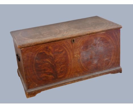 A late 18th/early 19th century New England grain painted pine lidded trunk, bead edge, original, lock and hinges, later wroug
