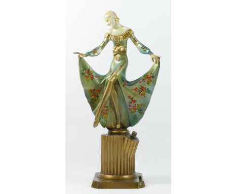 An Austrian Art Deco table strike lighter, after Josef Lorenzl, cold painted spelter, depicting a dancing flapper girl.28cm t