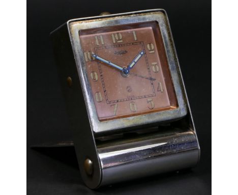 Jaeger Travel Clock, Switzerland, mid-20th century, the copper dial with luminous Arabic numerals, inner minutes ring, and lu
