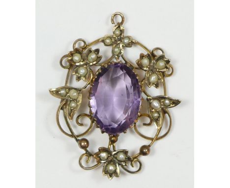 A late Victorian 9ct gold, amethyst and half pearl pendant, 9ct tab, the central mixed cut stone 15 x 10mm, within an openwor