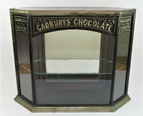 A rare Victorian Cadbury's Chocolate, Makers to the Queen ebonised octagonal display cabinet, with mother of pearl lettering,