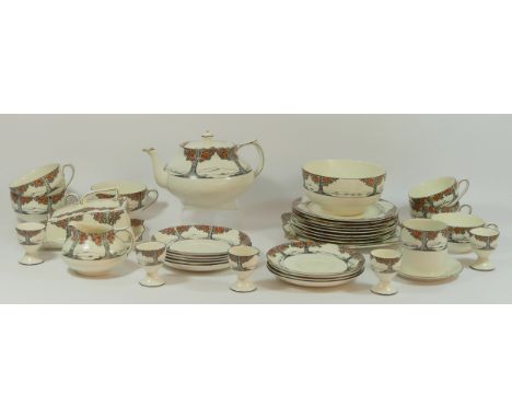 A Crown Ducal Orange Blossom pattern part breakfast service, comprising; tea pot, milk jug, butter dish with cover, three tea