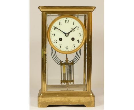 A 19th Century French brass four glass and gilt metal eight day mantel clock, with plain case, mercury double pendulum, all g