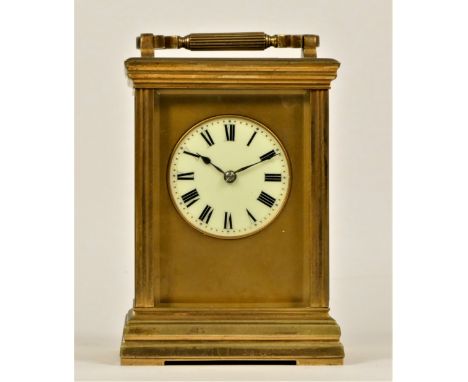 A late 19th century brass striking carriage clock, Roman numerals, striking the hours and half on a gong, 15cm 