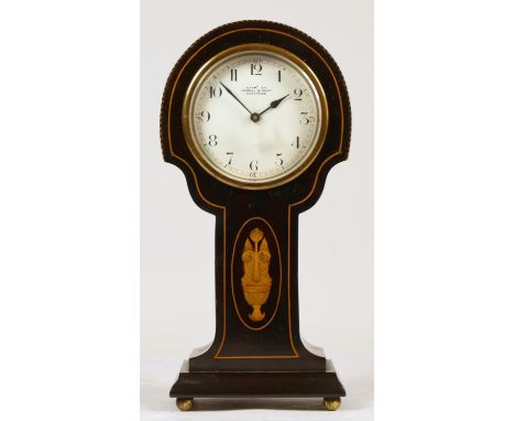 An Edwardian mahogany mantel clock with boxwood inlay, retailed by Kendal &amp; Dent, Cheapside, French movement - 26.5cm. 