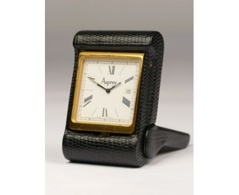 Asprey, a leather folding travel alarm with date quartz clock, model 2576, 6.5 x 4.5 x 1.5cm. 