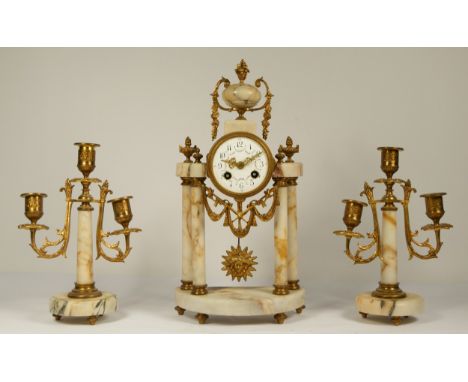 Japy Freres et Cie, Paris, a late 19th century French clock garniture, with columns, sunburst pendulum, striking on a bell, l