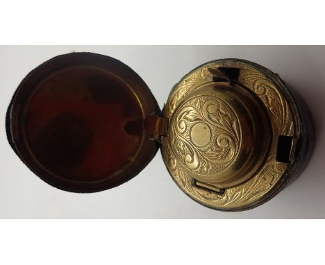 Travelling late Victorian inkwell, brass chased in leather case 
