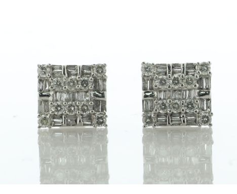 These charming 14ct white gold stud earrings are each with ten round brilliant cut diamonds and twenty tapered baguette cut d