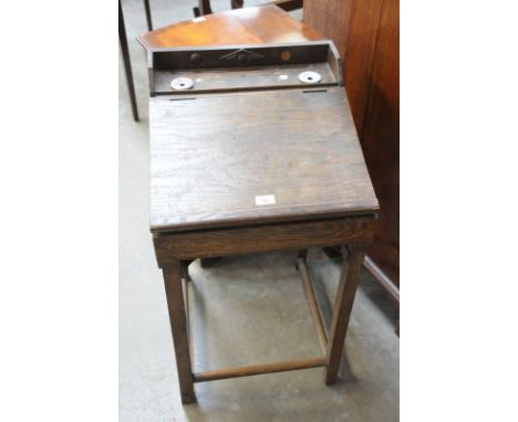 A Vintage child's oak school desk.
