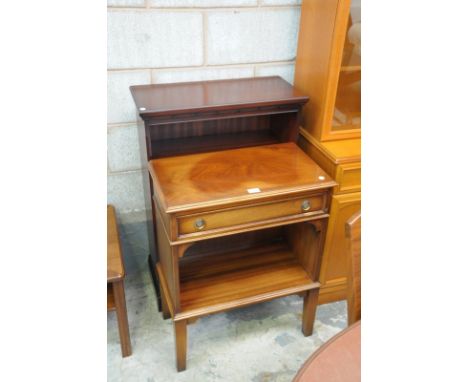 A Reprodux mahogany side cabinet with a single frieze drawer above an open shelf and a mahogany open bookcase. (2)