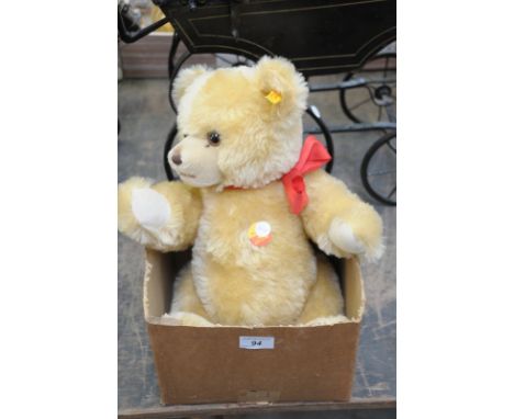 A Modern Steiff golden plush Teddy bear.