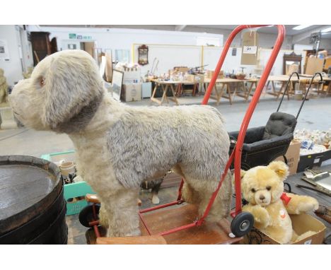 A Vintage Pedigree push along soft toy dog.