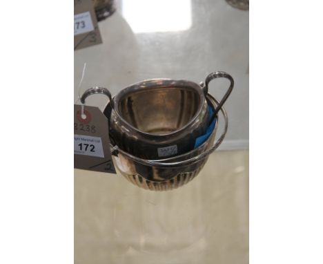A Silver swing handled semi lobed bowl , London 1897 and a silver 2 handled sugar basin . ( 9.8 ozs )