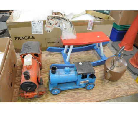 A Vintage Tri ang tin plate model locomotive, a smaller example, a painted wooden rocking horse and a Victorian copper kettle