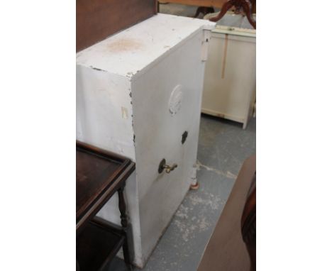 A substantial cast iron safe manufactured by J Grove, Birmingham
Of upright rectangular form with an oval plaque stamped J Gr