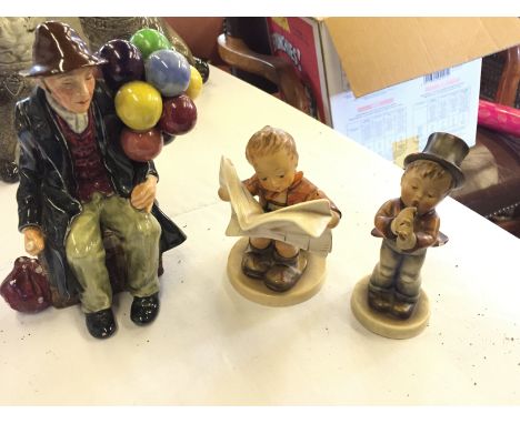 A Royal Doulton "The Balloon Man" and two Hummel figures.