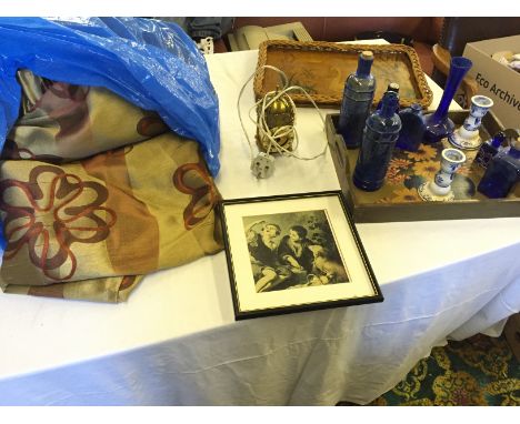 A selection of blue glass, a painted tea tray and a set of curtains.