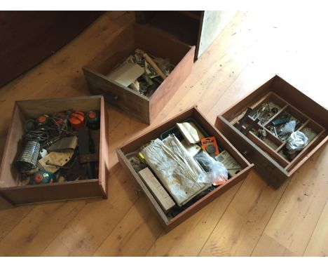 *A three drawer chest containing various old tools.